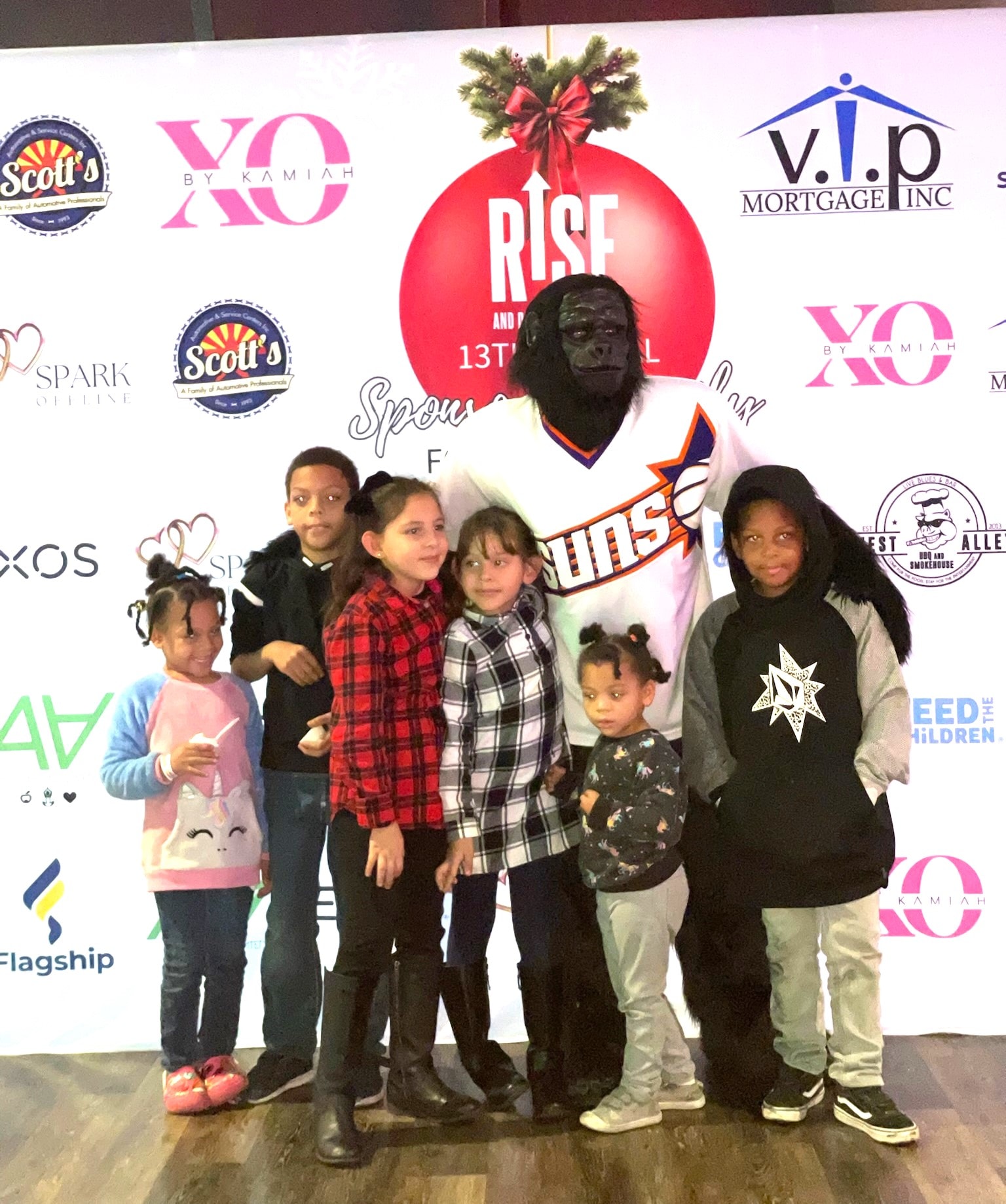 RISE Holiday Giving event with families and community