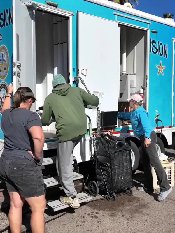 RISE volunteers providing outreach and essential support